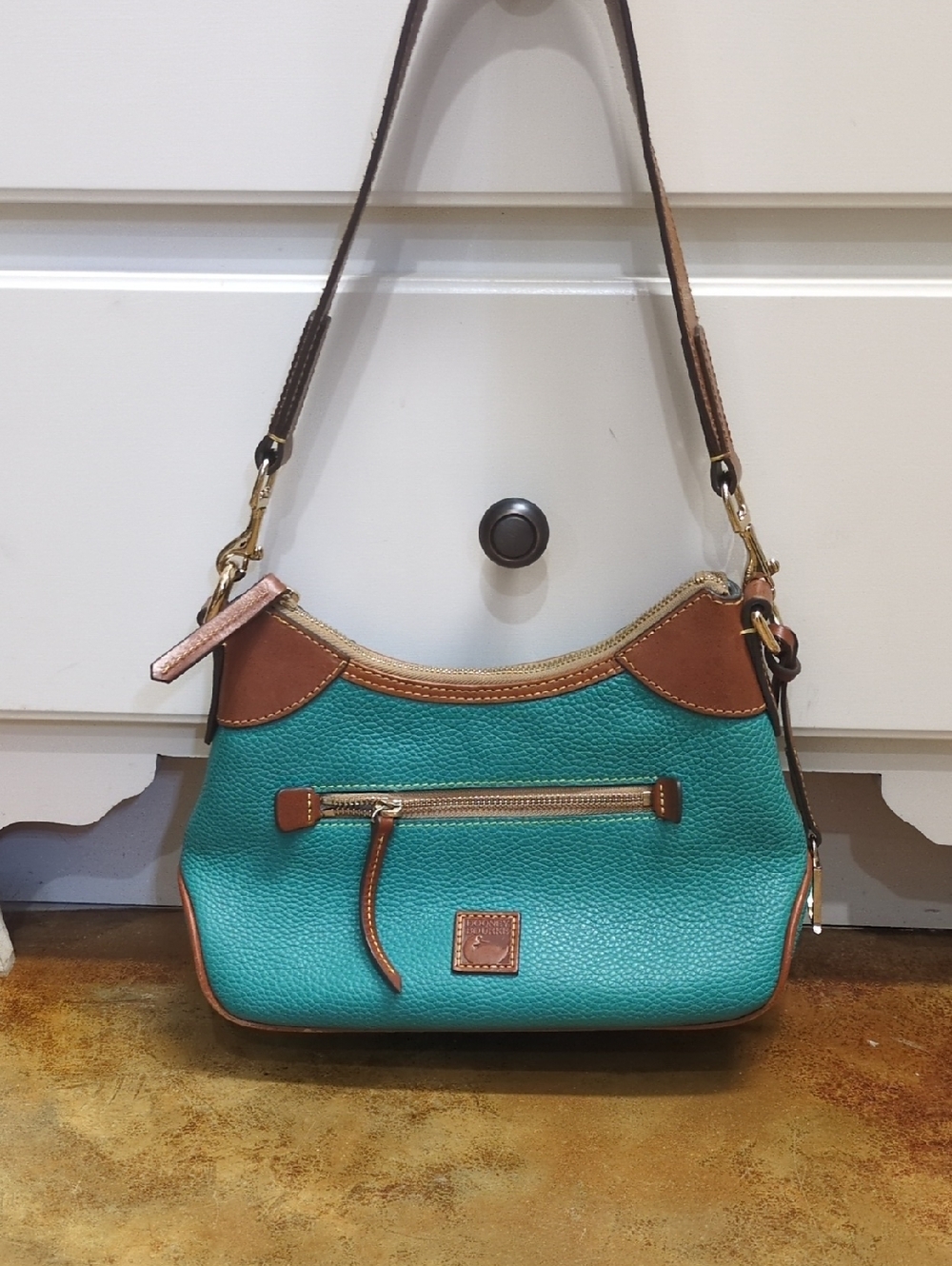 Dooney & Bourke Teal Pebbled Leather Shoulder Bag with Brown Trim